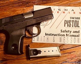 SMITH & WESSON Sigma SW380 (.380 Caliber) with One Extra Clip