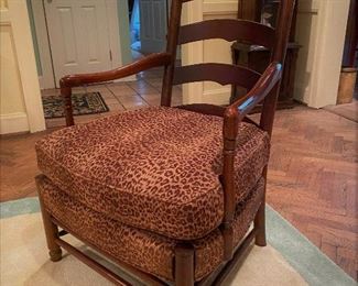 Antique English ladder back arm chair with faux leopard skin upholstery 