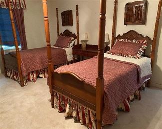 A pair of matching antique four poster beds, circa 1870