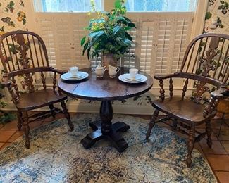 A matching pair of vintage ETHAN ALLEN Royal Charter oak windsor chair and a drop leaf tavern stile pedestal table. 