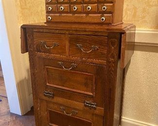 Antique oak barbershop cabinet and an antique spice drawer cabinet