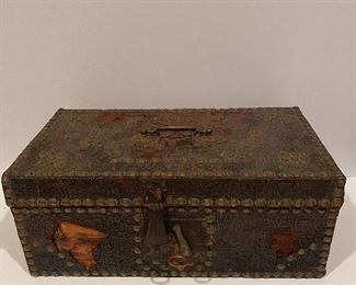 Antique lock box with leather covering with nail head trim