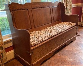 American Colonial revival style bench with lower storage. 