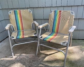 A pair of vintage folding chairs