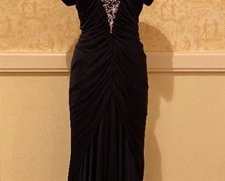 A formal vintage 80s evening gown by Lillie Rubin.  It is a size 4 and has been well cared for by the original owner 
