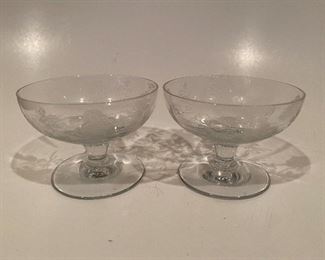 Early 20th century footed nut bowls with rose etchings of the elegant glass era.
