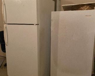 A working Refrigerator with freezer over the fridge and a working Freezer 