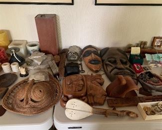 masks, candle holders, instruments, assorted nicknacks
