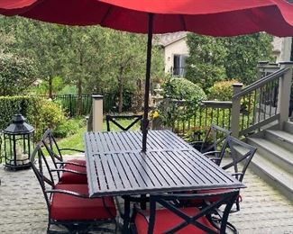 Outdoor dining table and 6 chairs with seat cushions, and red umbrella - very nice!