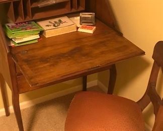 Vintage writing desk and oak chair with upholstered seat