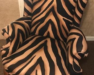 Zebra pattern upholstered wing back chair