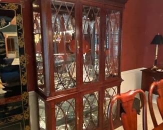 Fabulous China Cabinet made of mahogany wood, with three glass shelves, perfect dimmer lighting!  Must see this beauty!!