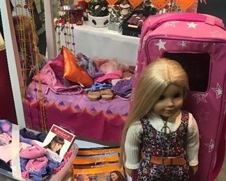 American Girl doll “Julie” with lots of clothes, her bed, sleeping bag, horse, and other accessories!