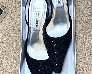 Black glimmer dress shoes by Caprros