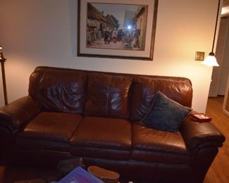 Beautiful Leather Sofa in Great Condition with the signed print by Wm. H. Ogden in the background