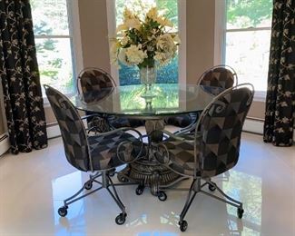 Beautiful kitchen dinette set with 4 Swivel/Rocking Chairs on rollerblade wheels to not scratch your floor, unlike coaster wells.  54" inch glass top.   Excellent Condition.  

Base: Heavy Solid Metal with Ornate Details

Built to last. Excellent condition.  ONLY $750 

Note: In a very clean home with no shoes, and no animals. 


