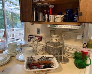 Many dishes in kitchen