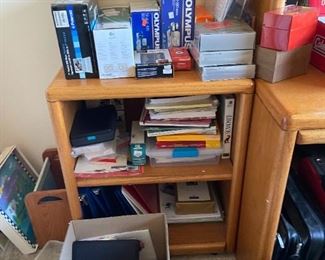 Office. Oak cabinet, oak computer desk. Many supplies, paper, envelopes etc.