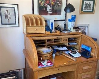 Old oak roll-top desk in office. $175