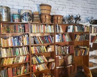 Excellent selection of vintage books including Native American, other cultures of the world, theology, & much more. Lard cans, peach 1/2 bushel baskets, antique fans. 