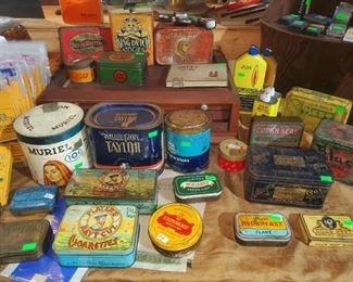 Great collection of tobacco tins. (The Corvette Zippo lighter display box is in the back of this photo)