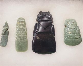 Pre-Columbian jade axe god pendants. 