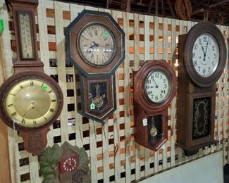 Hanging wall clocks. Banjo clock.