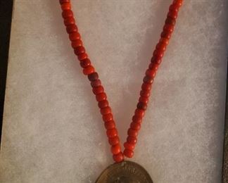 Garfield Indian Peace Medal on trade beads.