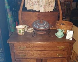Antique oak wash stand, pottery covered dish, & more. 