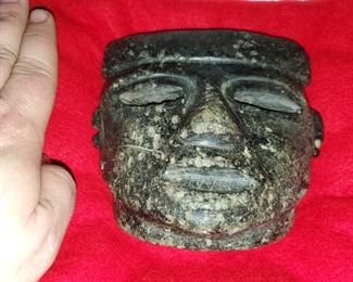 Stone certified to date to over 1700 years ago. Carved stone mask. Possibly Olmec. 