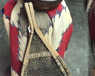 Native American snow shoes, covered basket