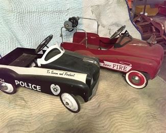 Vintage Police and Fire pedal cars