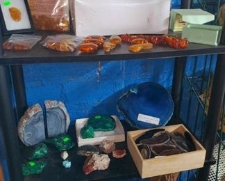 Fossils, rocks, and minerals including Amber, Malachite, geodes. Also drift wood pieces. 