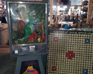 Jurassic park style coin operated gumball machine. Carnival/circus antique coin toss table top. 