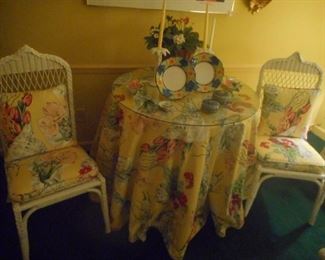 LARGE ROUND TABLE w/GLASS $40 tablecloths separate; 2 WHITE WICKER SIDE CHAIRS $50 each