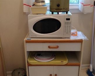 Micro Wave and a Microwave Table Cart or Kitchen, Laundry Room Storage Cart Cabinet.