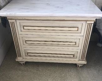 Pair of American of Martinsville Hollywood Regency style nightstands in white wash finish and marble tops
