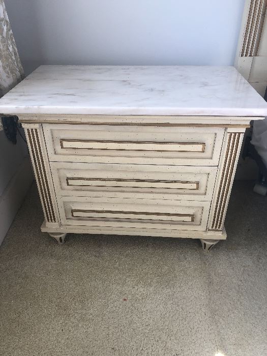 Pair of American of Martinsville Hollywood Regency style nightstands in white wash finish and marble tops