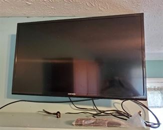 Samsung TV w/ remote and wall mount