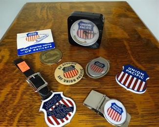 Union Pacific clock, luggage tag, pin backs, money clips, matches, golf tees
