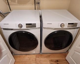 High end Samsung washer and dryer set. Like new condition. Dryer is gas. Both steam as well