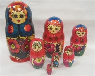 RUSSIAN NESTED DOLLS. TALLEST 7.75" TALL.
