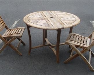 OUTDOOR INTERIORS FOLDING PATIO TABLE AND TWO FOLDING CHAIRS. NEEDS ONE HINGED REPLACED