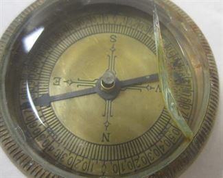 AS FOUND WHITE STAR POCKET COMPASS. GLASS IS CRACKED.