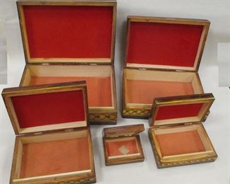 SET OF FIVE RUSSIAN NESTED BOXES. LARGEST ONE IS 9.25" WIDE