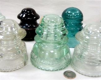 SIX GLASS AND ONE CERAMIC INSULATORS