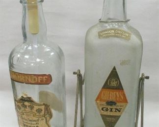 TWO LARGE LIQUOR BOTTLES FOR SERVING. 18" TALL