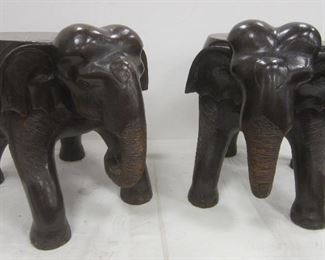 PAIR OF WOOD ELEPHANT PLANT STANDS. 11.75" TALL, ONE HAS NATURALLY OCCURING CRACK FROM SHRINKAGE