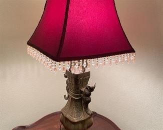 $150  •  #8.  Oriental brass lamps with red shades shades • 30 high 7 1/2 wide