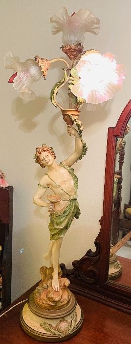 $150 •  #35.  Victorian era Roman inspired light bearer 3 globe lamp • 41high nine across 